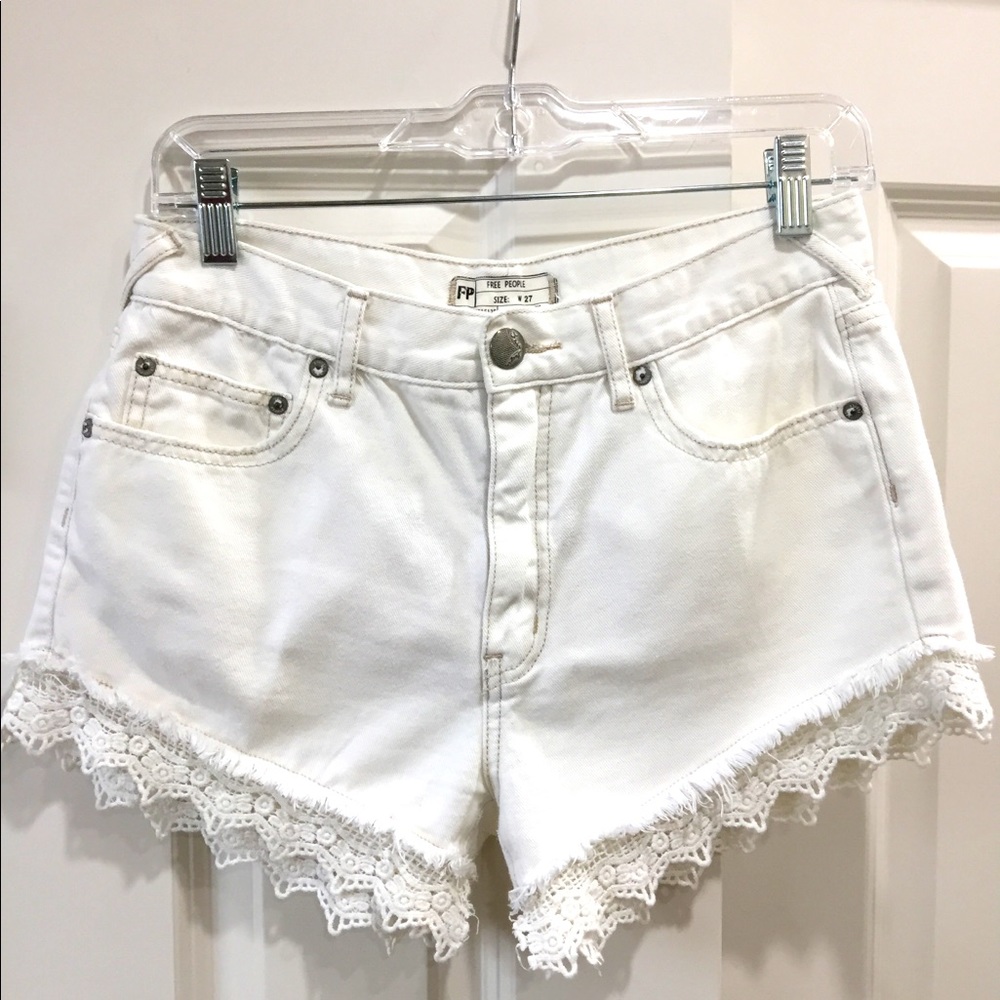 Free People white denim shorts with lace trim